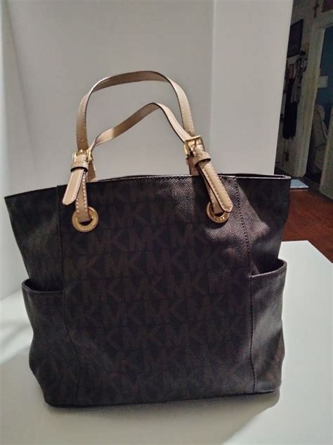 sell used michael kors handbags.